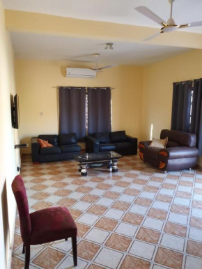 EXECUTIVE APARTMENT, 2 master ensuite bedrooms, 3 toilets, 3 baths, hot water, air conditioned, separate fitted kitchen, separate living room, large compound, 24hr security, electric fenced wall, rest